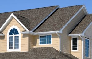 brown roofing with tan siding